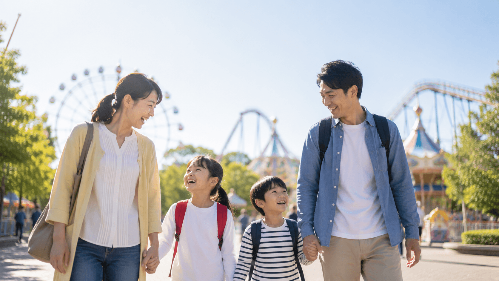 朝の遊園地で楽しい時間を過ごす家族のイメージ